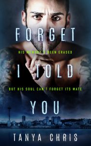 Cover for Forget I Told You shows a man holding a finger to his lips in a shush gesture