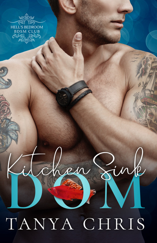 Cover for Kitchen Sink Dom by Tanya Chris shows a bare-chested man wearing leather wrist cuffs and both arms covered in tattoos. A red fish swims through the O in Dom