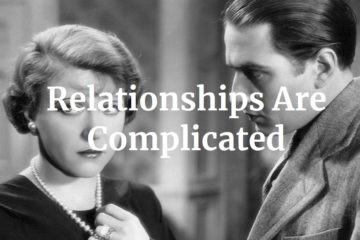 A black and white image of a woman in pearls and a man in a suit with the text "Relationships Are Complicated"
